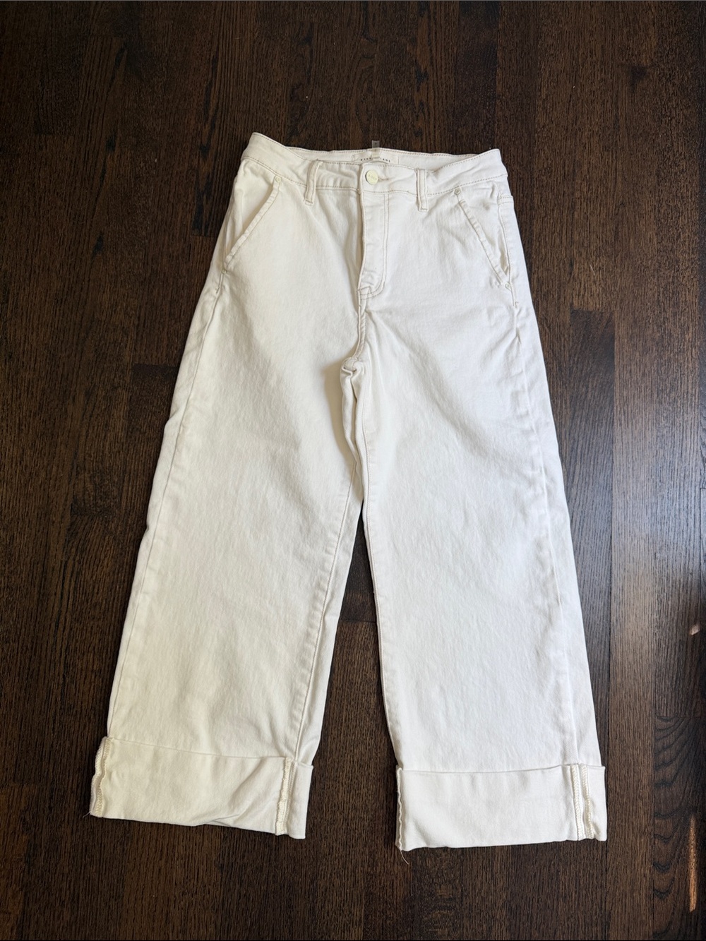 Risen brand off white denim with cuffed hem.